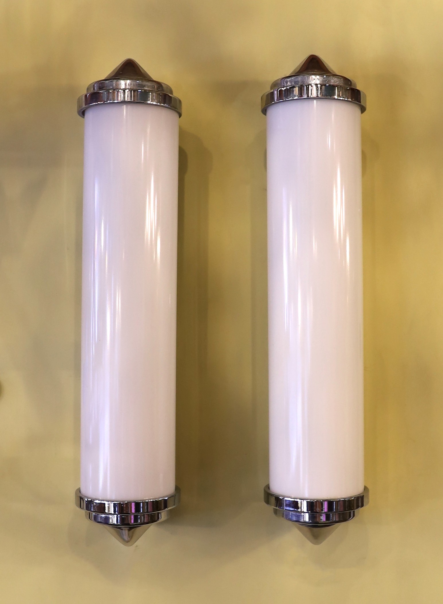 A pair of 1970s Dutch nickel plated and opaque white glass wall lights, height 37cm